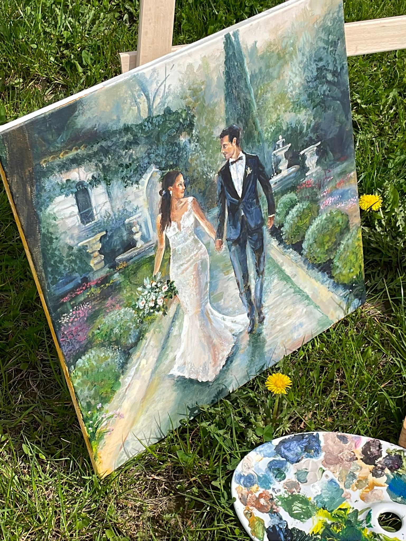Live wedding painting by Jowita – easel and couple during ceremony